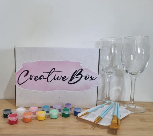 DIY wine glass painting kit with 2 wine glasses, colourful paints, brushes, and palette by Creative Box