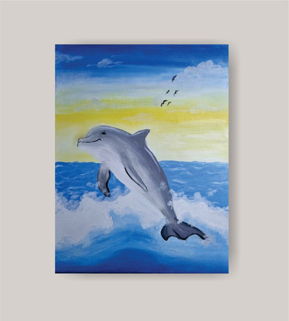 DIY dolphin painting kit with canvas, paints, brushes, apron, and step-by-step tutorial by Creative Box