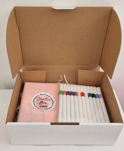 "Printed canvas with unicorn design, acrylic markers, and easel DIY art kit by Creative Box"